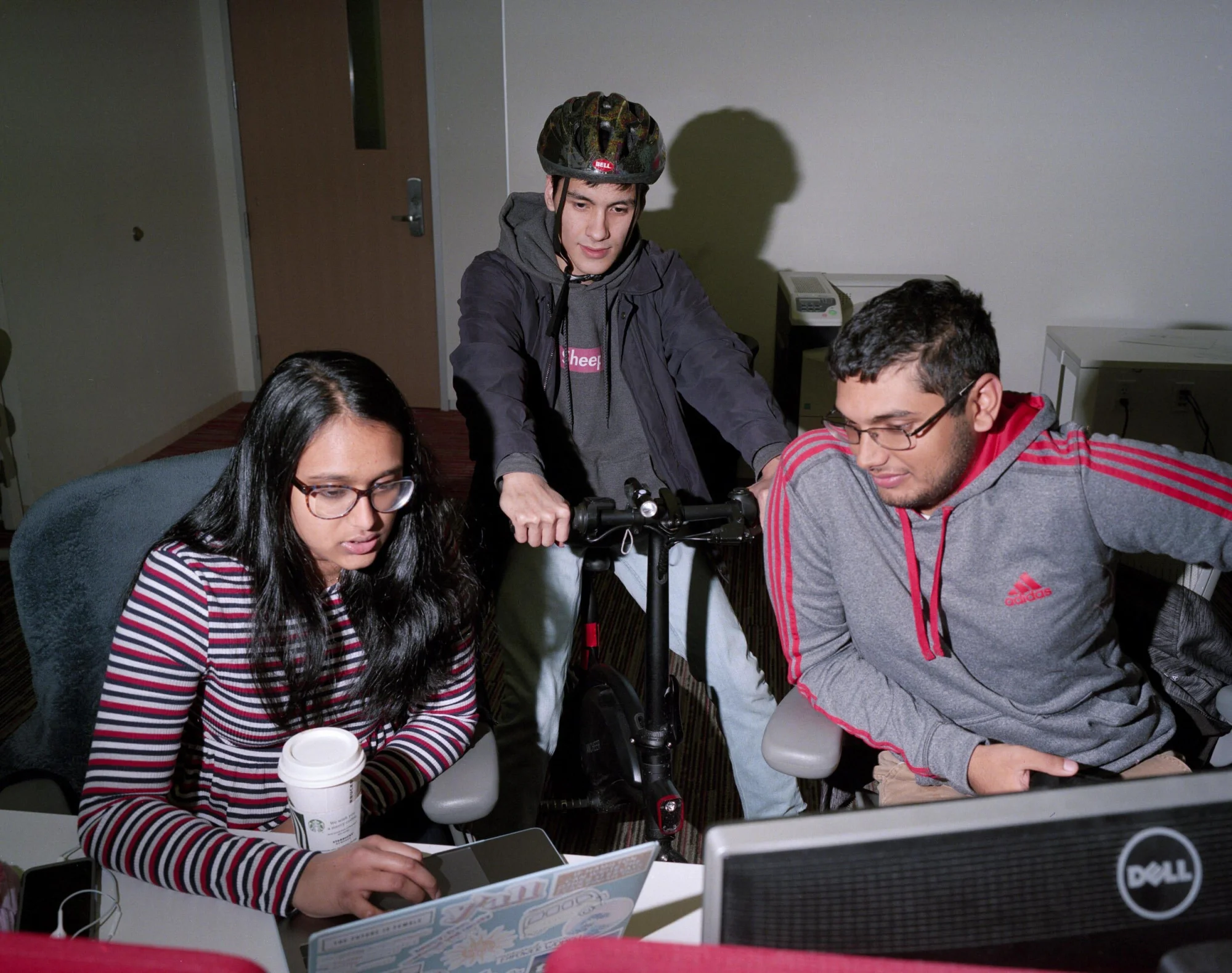 students around computer