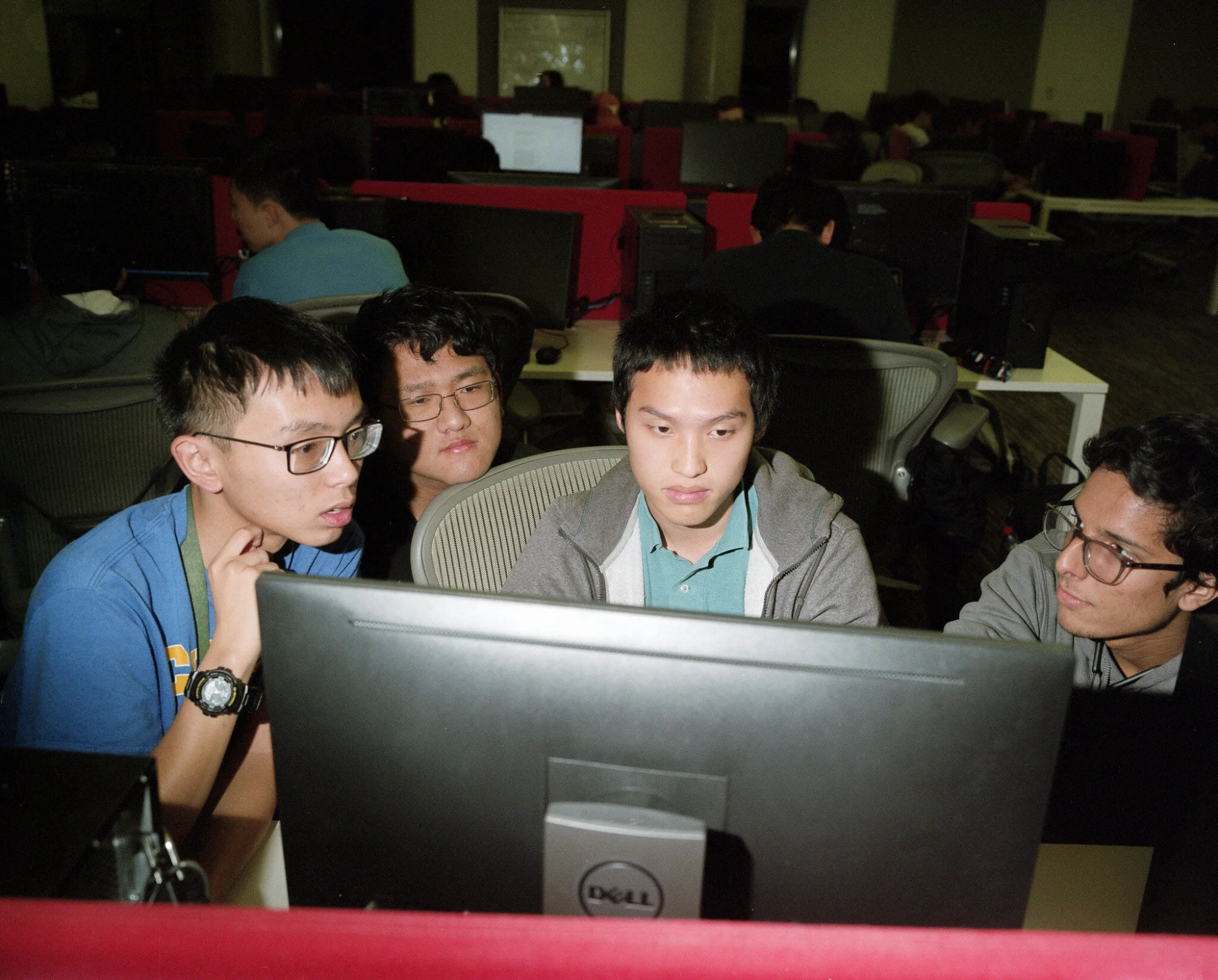 group working around computer